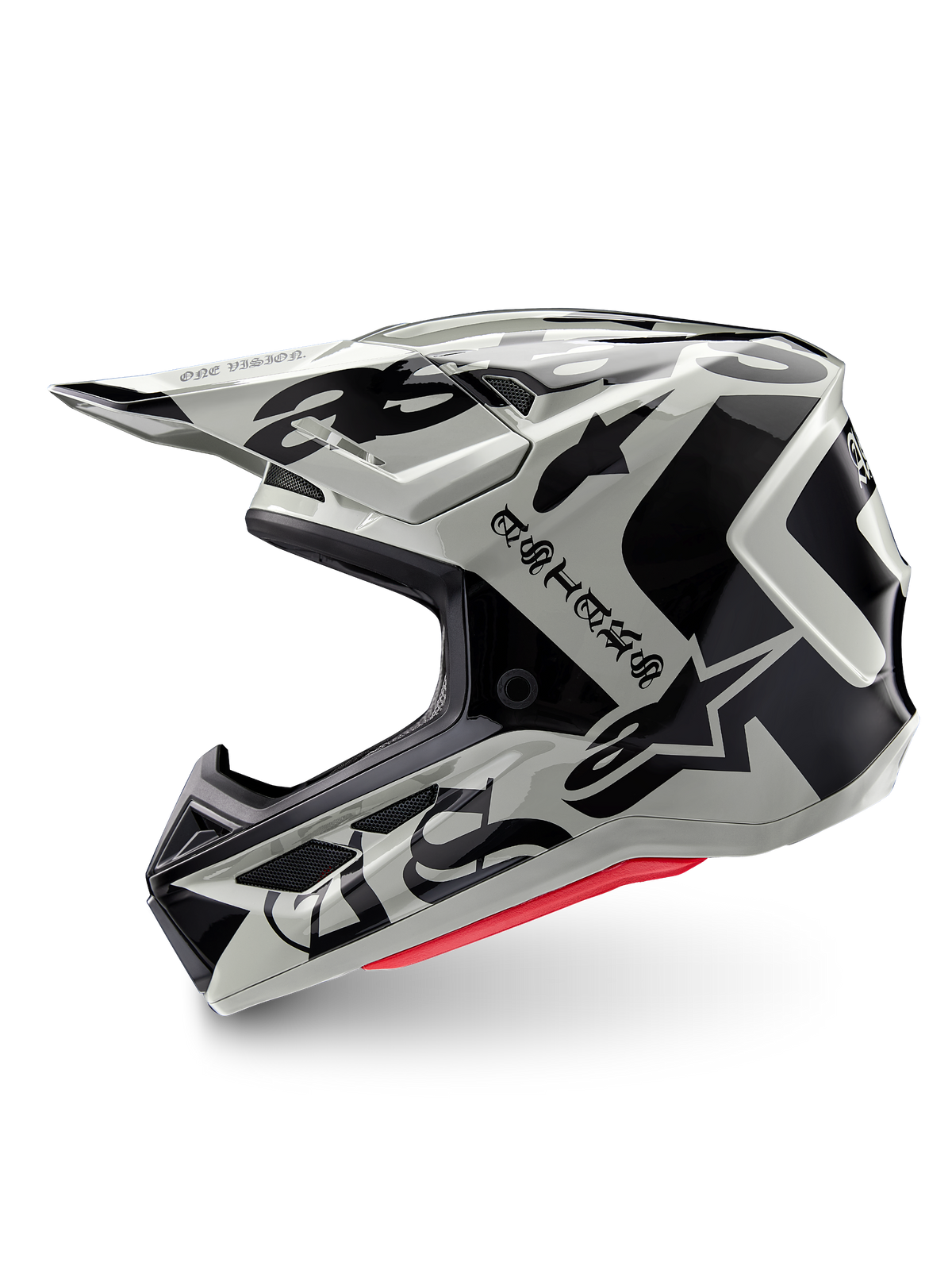 Alpinestars Limited Edition S-M7 Wolf Dust Helm, Motocross-Helm, Dune Black Glossy, off-white Schale mit schwarzem gotischem ASTARS-Branding und grafischen Mustern, rote Innenpolsterung sichtbar, aerodynamisches Profil für den Offroad-Rennsport