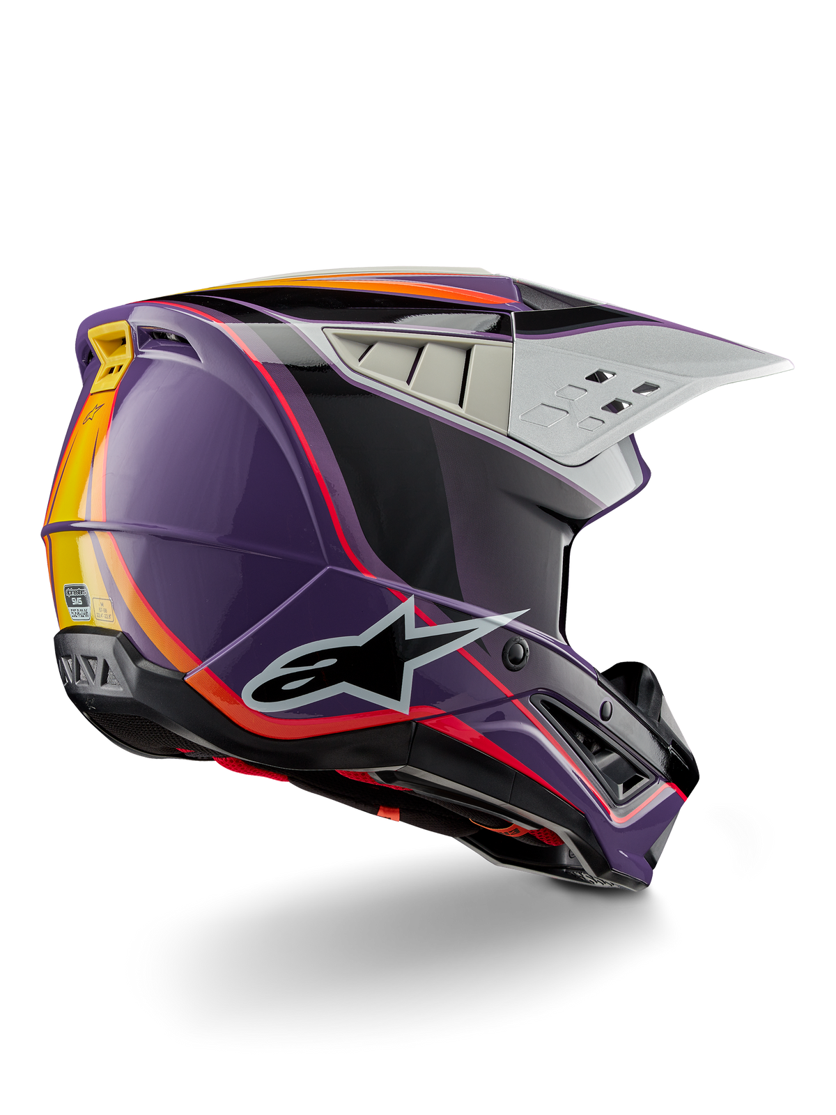 Alpinestars S-M5 Sail Helm ECE, Motocross-Helm, Violett Schwarz Silber Glänzend, mit orangefarbenen und gelben Streifenakzenten, großes schwarzes Stern-Logo, aerodynamisches Profil mit hinteren Belüftungsöffnungen, glänzendes Finish für den Offroad-Rennsport