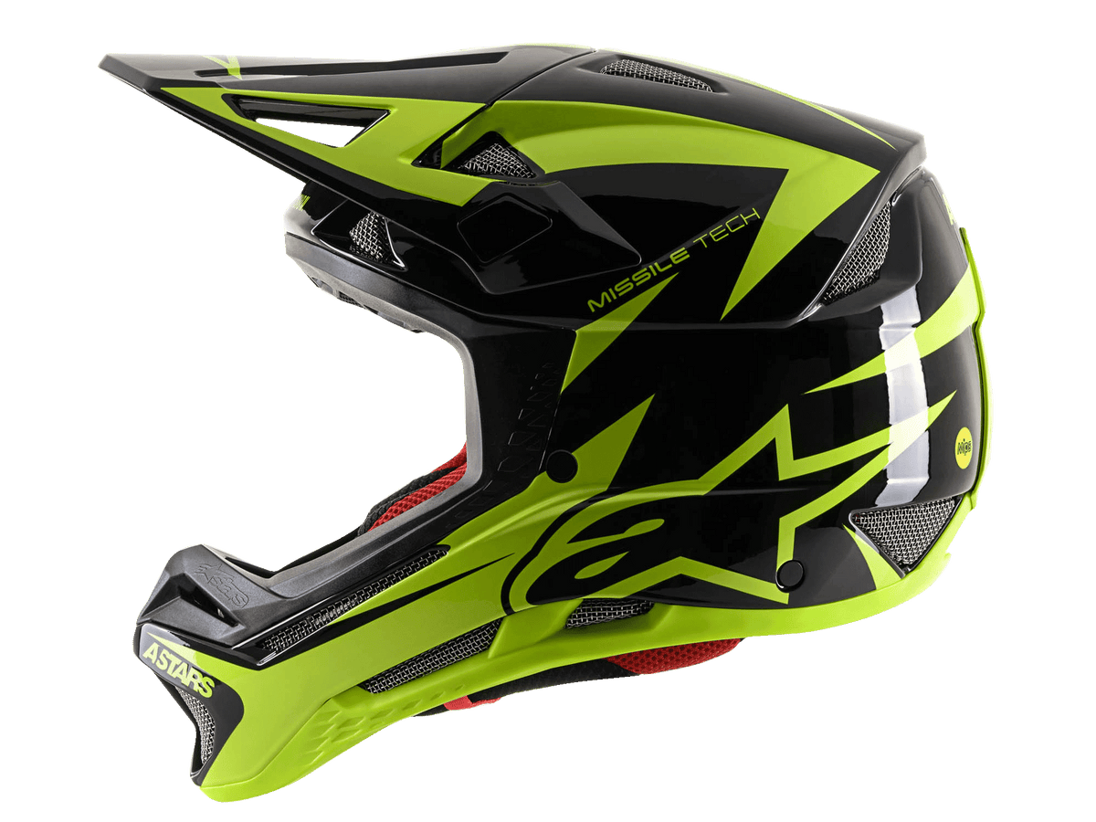 Alpinestars Missile Tech-Air Full Face Helmet, MTB Full Face Helmet, Black and Yellow Fluo Glossy, side profile view highlighting large yellow star logo, mesh air vents, and aerodynamic visor for downhill mountain bike riding.