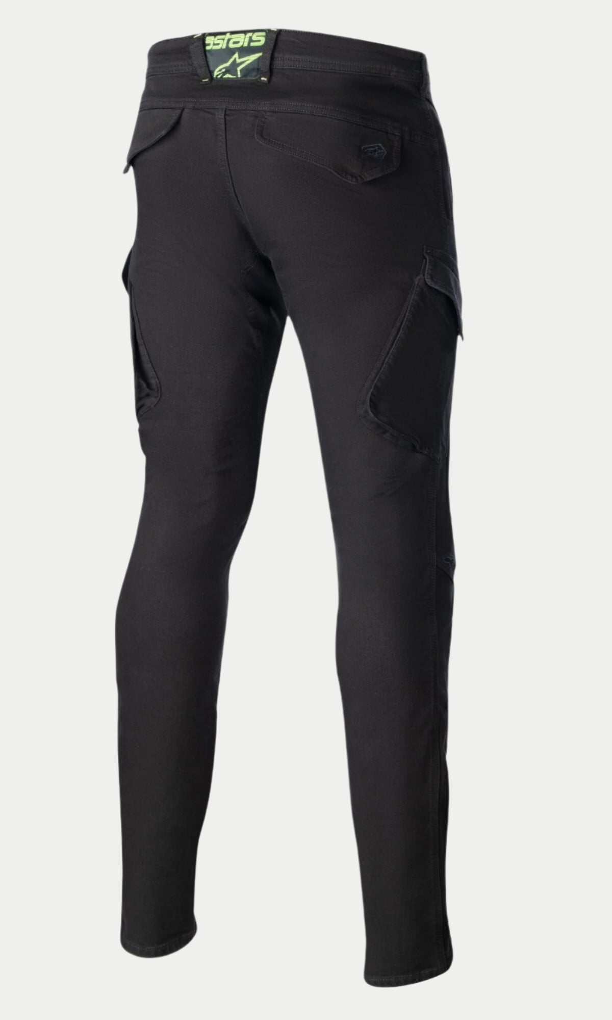 Alpinestars Caliber Slim Fit Tech Riding Pants, Black, rear view highlighting the slim tapered fit, combat-style cargo pockets, and back flap pockets with a lime green logo patch on the waistband.