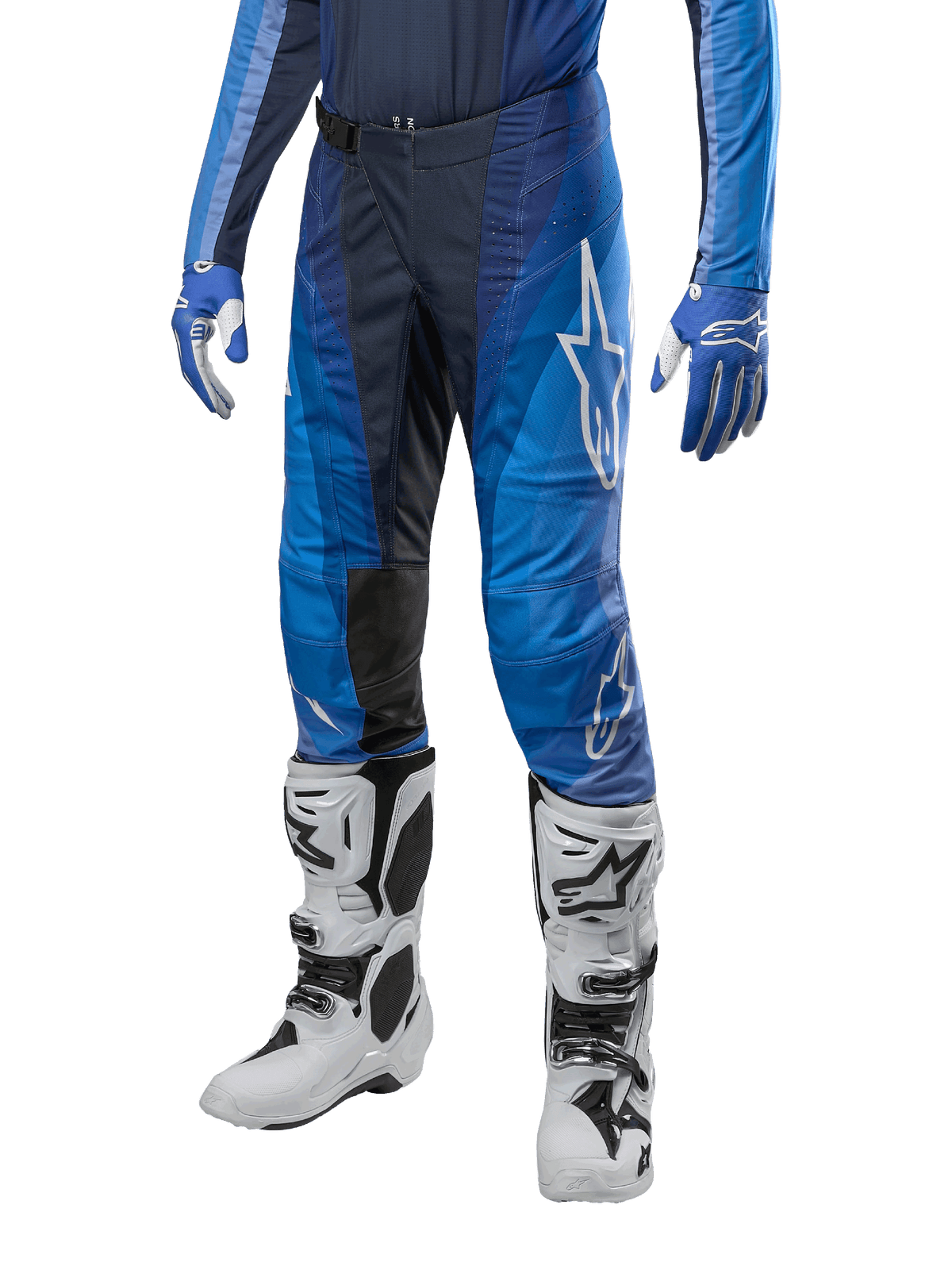 Alpinestars 2024 Techstar Pneuma Pants, Motocross Pants, Dark Navy and Light Blue, worn with matching blue jersey and white boots, featuring white logo on thigh, textured grip areas, sleek sporty design for off-road racing