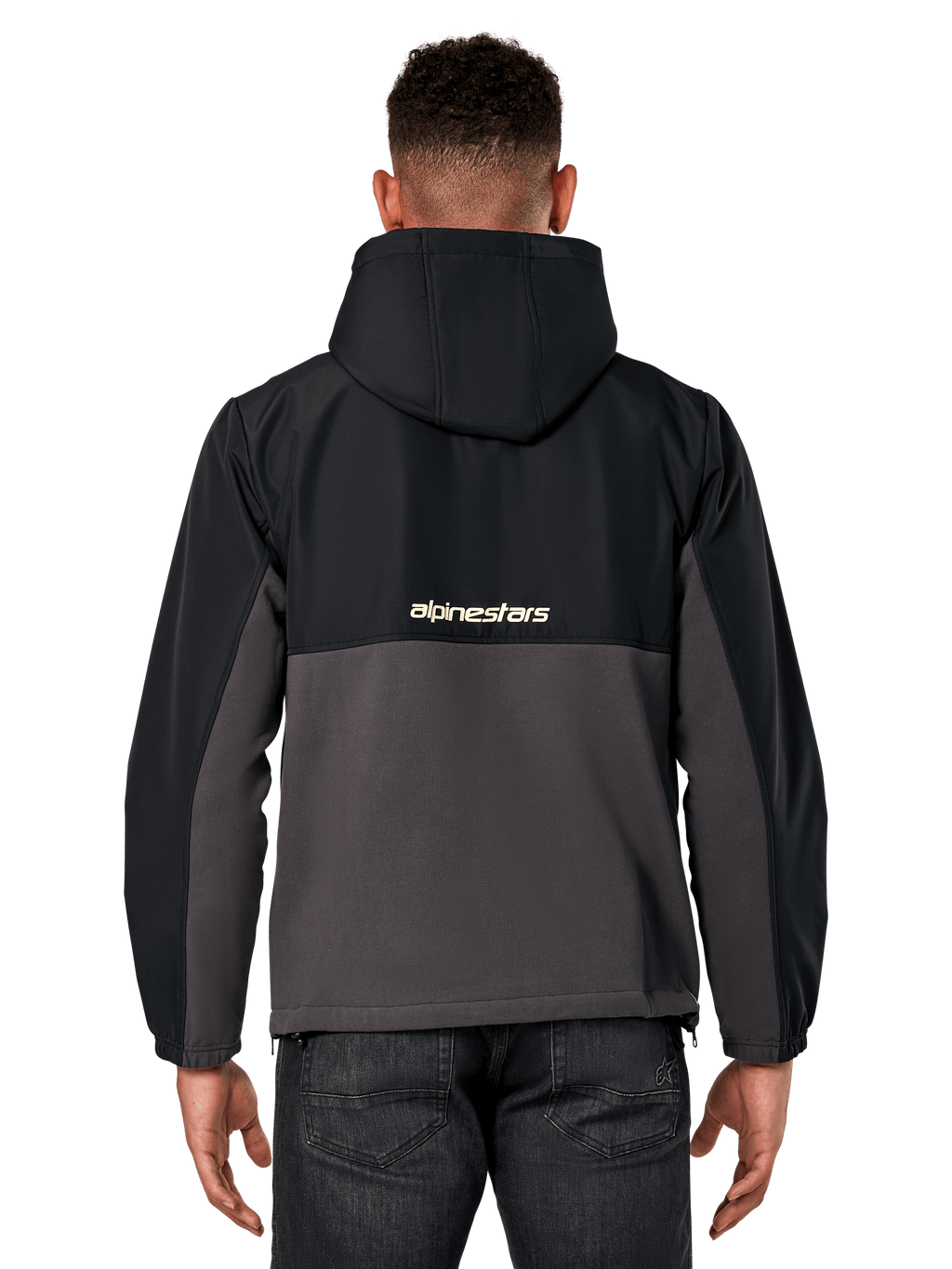 Alpinestars Juncture Hybrid Jacket, Back View, Black and Gunmetal, casual sportswear anorak with mixed material construction, ripstop upper and canvas fleece lower, Alpinestars logo on back, worn with dark pants