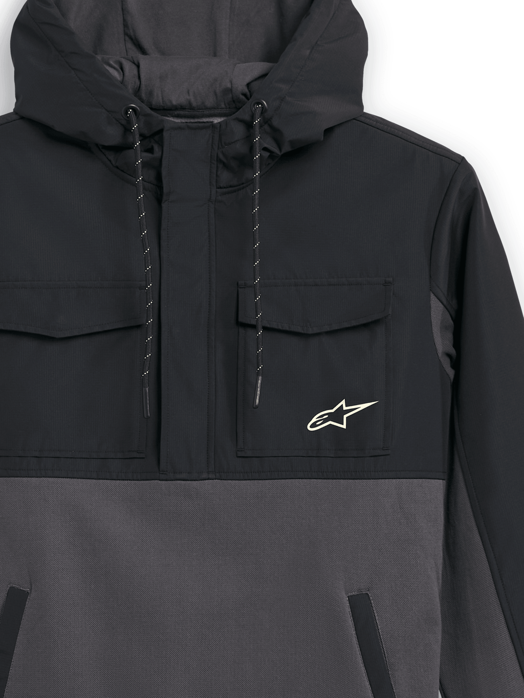 Alpinestars Juncture Hybrid Jacket, Black and Gunmetal, close-up view of the front, mixed-material anorak with ripstop chest pockets and canvas fleece body, Alpinestars star logo on chest, drawstring hood, casual motorsport streetwear