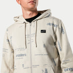 Alpinestars Plenitude Hoodie, zip-front fleece in Off White, all-over graphic print with 'alpinestars' and '1963' text, black logo embroidery patch on chest, drawstring hood, casual motorsport-inspired streetwear