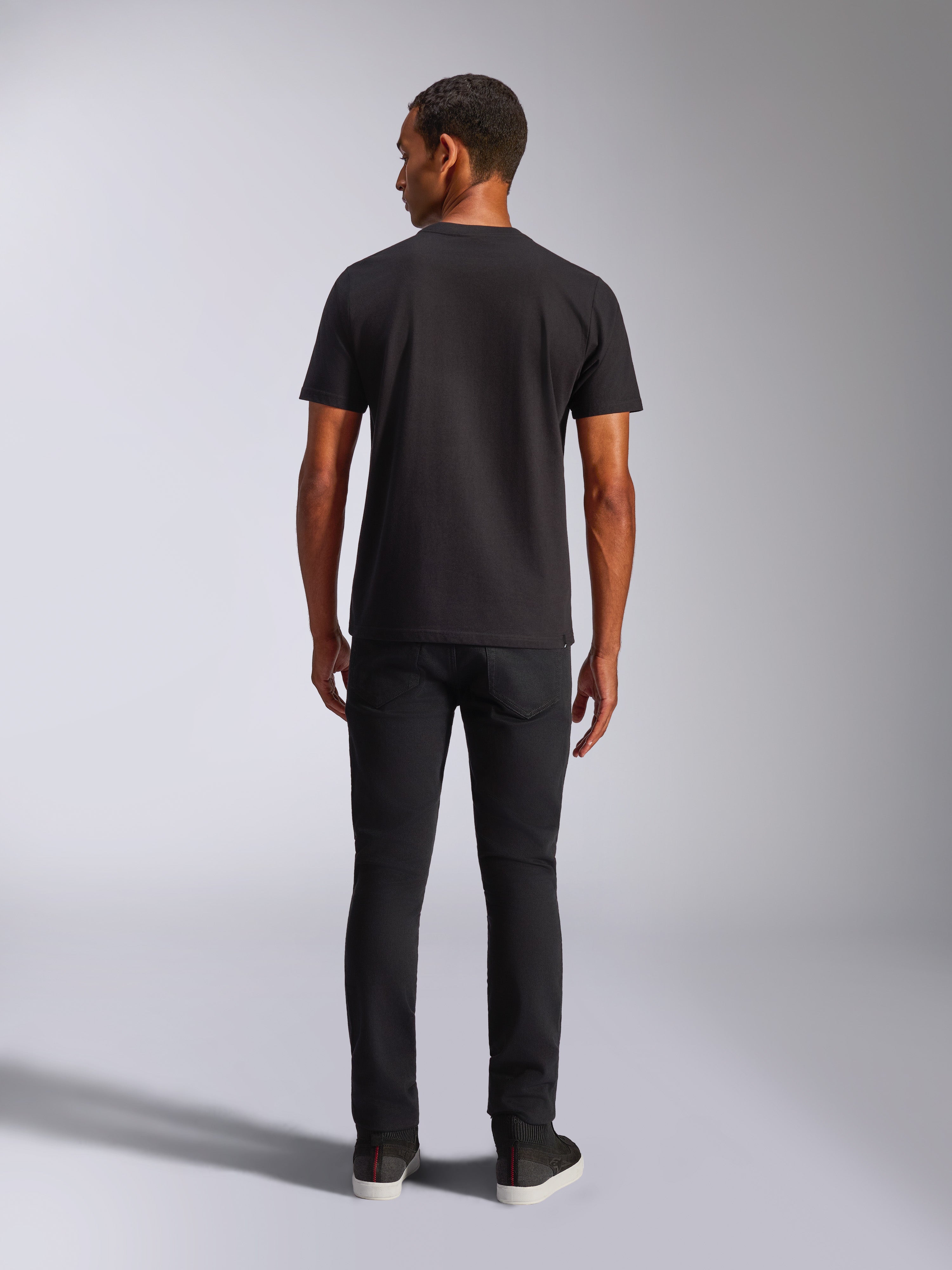 Alpinestars Blaze 2.0 CSF Tee, Short Sleeve T-Shirt, Black, Back View, worn with black jeans, casual motorsport-inspired streetwear