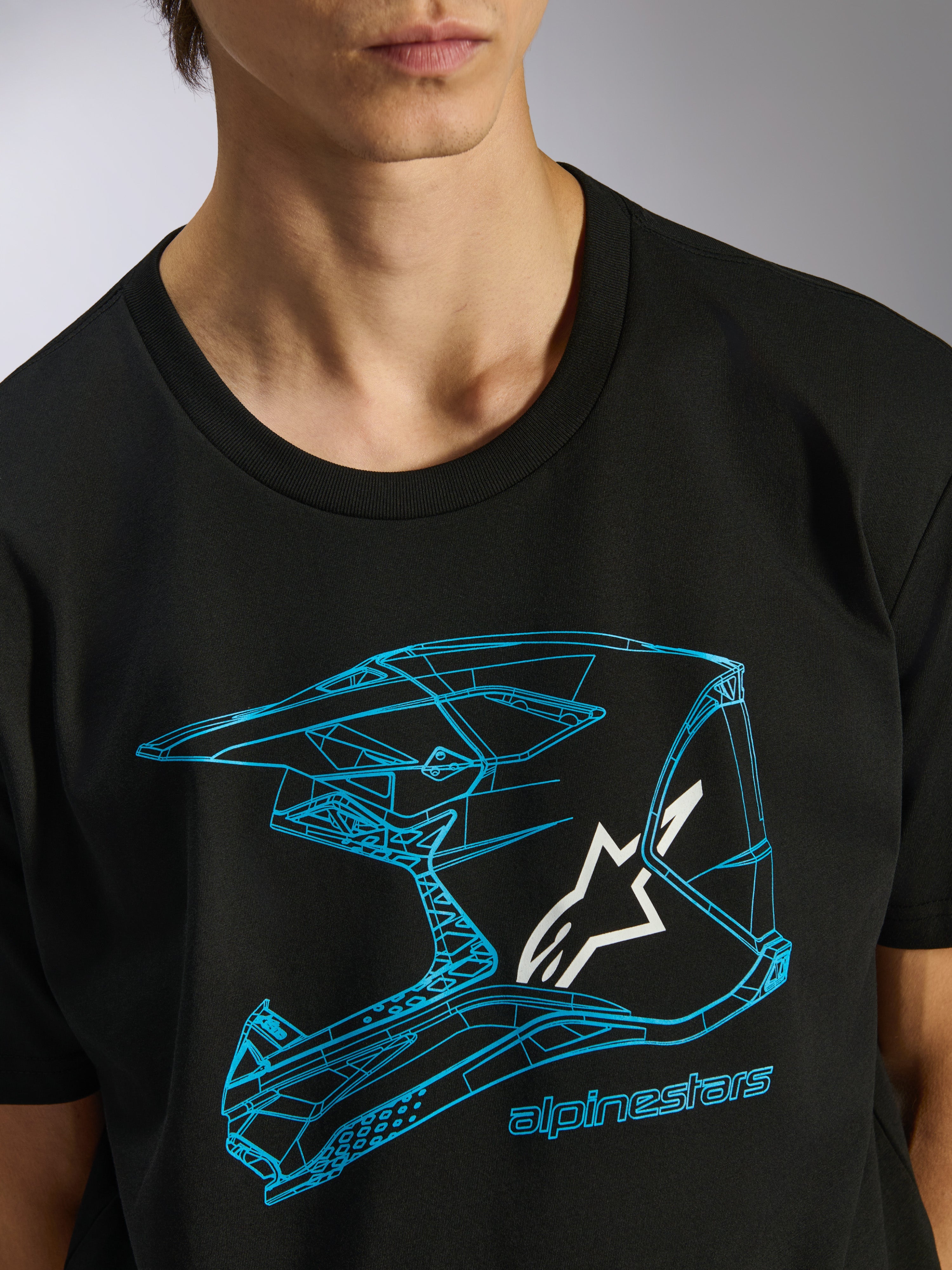 Alpinestars CSF Tee, Kurzarm-T-Shirt, Schwarz, blaue Motocross-Helm-Grafik mit weißem Stern-Logo, lässige Motorsport-Streetwear