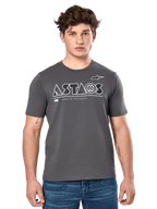 Alpinestars Cereal CSF Tee, Charcoal Gray Short Sleeve T-Shirt, worn by a male model with blue jeans, white ASTARS geometric logo and 'Premium Racewear' text, casual motorsport-inspired lifestyle apparel