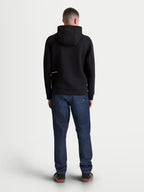 Alpinestars Cypher Hoodie, Premium Black Sportswear Zip-Front Fleece Hoodie, Back View on Model showing High Neck Hood and minimalist logo detail, Tri-blend Performance Fabric, Unisex Casual Streetwear and Motorsports Lifestyle.