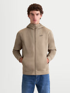 Alpinestars Cypher Hoodie, Herren-Kapuzenjacke mit durchgehendem Reißverschluss, Beige, Tri-Blend-Doppelgewebe-Fleece, Kapuze mit hohem Kragen, Nahttaschen und schwarzes Alpinestars-Logo auf der Brust, Motorsport-inspirierter Look