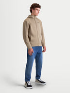 Alpinestars Cypher Hoodie, Herren-Kapuzenjacke in Putty-Beige, Sportswear-Hoodie mit durchgehendem Frontreißverschluss, Kapuze mit hohem Kragen und Tri-Blend-Doppelgewebe-Fleece für einen modernen Motorsport-Look, Beige.