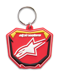 Alpinestars Plate Keyfob, 3D molded keychain, Red Yellow and Black, white Alpinestars logo and Astars star symbol, silver metal snap ring, motorsport-inspired MX plate design
