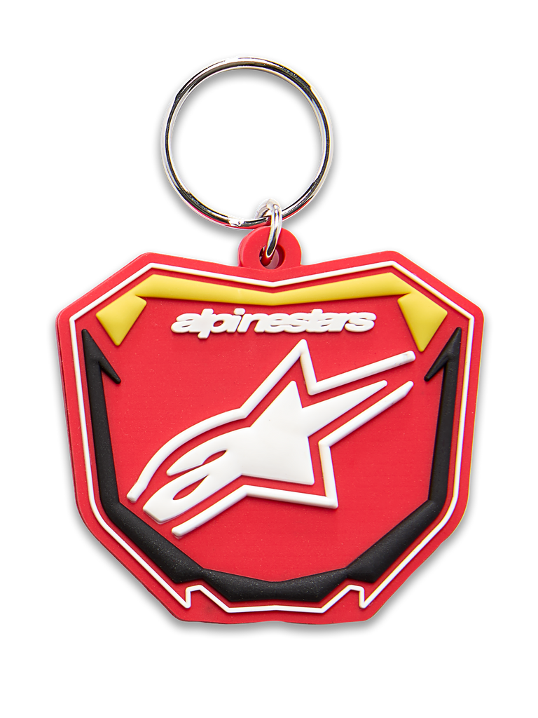 Alpinestars Plate Schlüsselanhänger, 3D-geformter Schlüsselanhänger, Rot, Gelb und Schwarz, weißes Alpinestars-Logo und Astars-Sternsymbol, silberner Metall-Schnappring, Motorsport-inspiriertes MX-Platten-Design