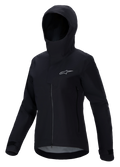 Alpinestars Stella A-Dura Elite Wasserdichte Jacke, Damen-Mountainbike-Jacke, Schwarz, mit Kapuze und schützender Sturmklappe, Frontreißverschluss, seitlichen Reißverschlusstaschen und verstellbaren Klettverschluss-Manschetten, technisches wasserdichtes Material mit silbernem Logo auf der Brust