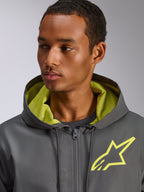 Alpinestars Speeder Chromium Windbreaker-Jacke, Anthrazit mit leuchtgelben Akzenten, gelbes Stern-Logo auf der Brust und passendes Mesh-Kapuzenfutter, leichte Freizeit-Windjacke