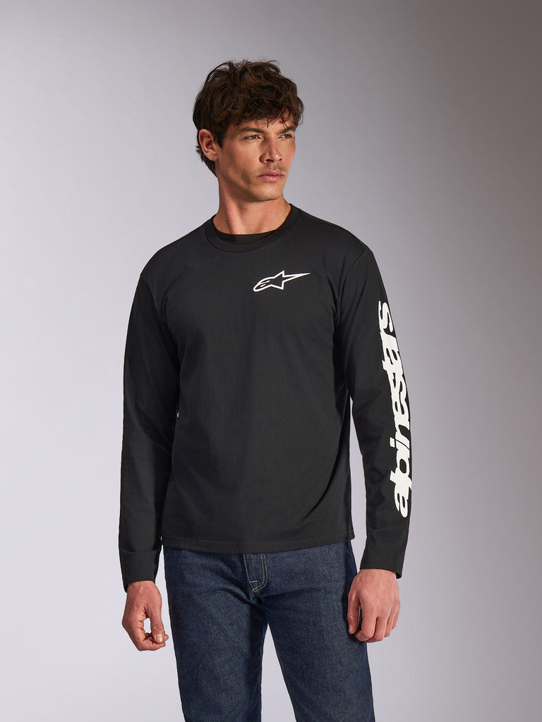 Alpinestars Trackside CSF Long Sleeve Tee, Black, white Alpinestars logo on chest and branding on sleeve, worn by a model with blue jeans, casual motorsport streetwear