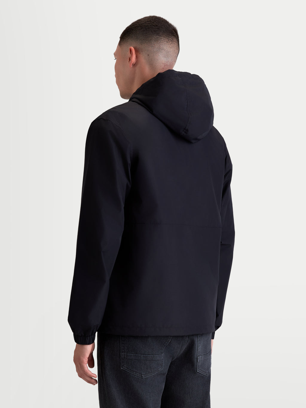 Alpinestars Speeder Resolve Windbreaker Jacket, Men's Sportswear Windbreaker for Urban Use, Black, back view on model, lightweight and breathable textile construction with an adjustable hood.