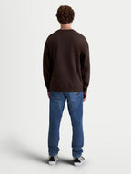 Alpinestars Guise Oversized Crew, Sportswear Fleece-Pullover, Braun, Unisex, entspannte Oversized-Passform, Rückansicht am Model, Baumwoll- und Recycling-Polyester-Mischung, Rippbündchen und Saum.