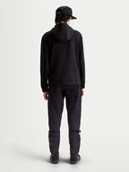 Alpinestars Datrix Hoodie, Premium Sportswear Kapuzenpullover, Schwarz, Rückansicht am Modell, Tri-Blend-Doppelfleece mit mesh-gefütterter Kapuze und motorsport-inspiriertem Stil.