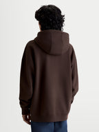 Alpinestars Prelude Oversized Hoodie, brauner Sportswear-Fleece-Pullover, Rückansicht mit entspannter Silhouette, selbstgefütterter Kapuze sowie Rippbündchen an Ärmeln und Saum, Premium-Freizeitbekleidung.