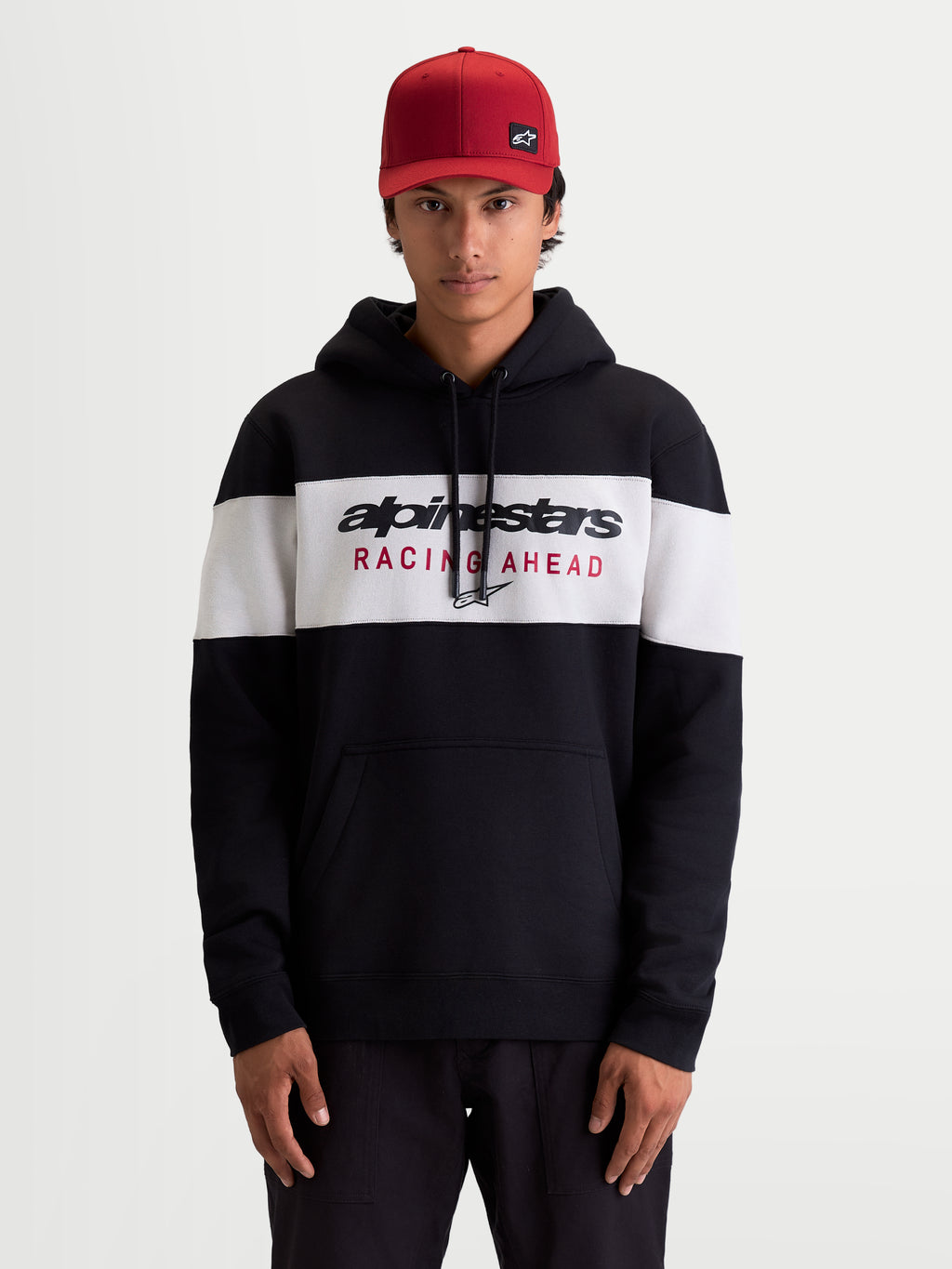Alpinestars Cubic Hoodie, Men's Sportswear Pullover Fleece, Black and White color-blocked design with bold Alpinestars Racing Ahead logo on the chest, features a drawstring hood and front pouch pocket, casual off-bike lifestyle apparel.