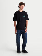 Alpinestars Post Oversized CSF Tee, Short Sleeve Casual Sportswear T-Shirt, Black with teal Astars word logo graphic, Oversized Fit, soft-hand print cotton blend, shown on model.