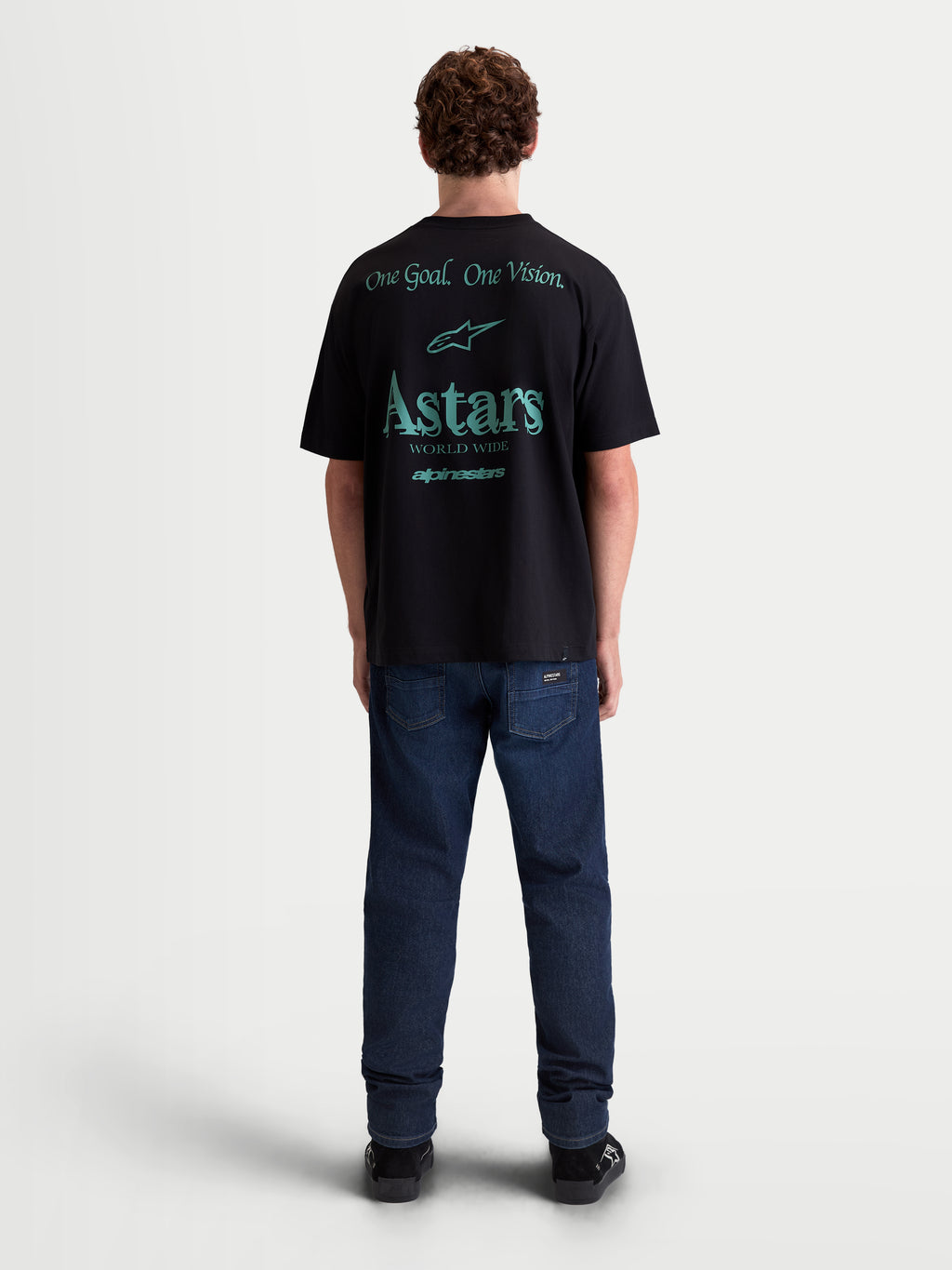 Alpinestars Post Oversized CSF Tee, Men's Oversized Sportswear T-Shirt, Black with Teal Graphics, features One Goal. One Vision. and Astars World Wide back graphics, soft cotton blend, relaxed fit for everyday comfort.