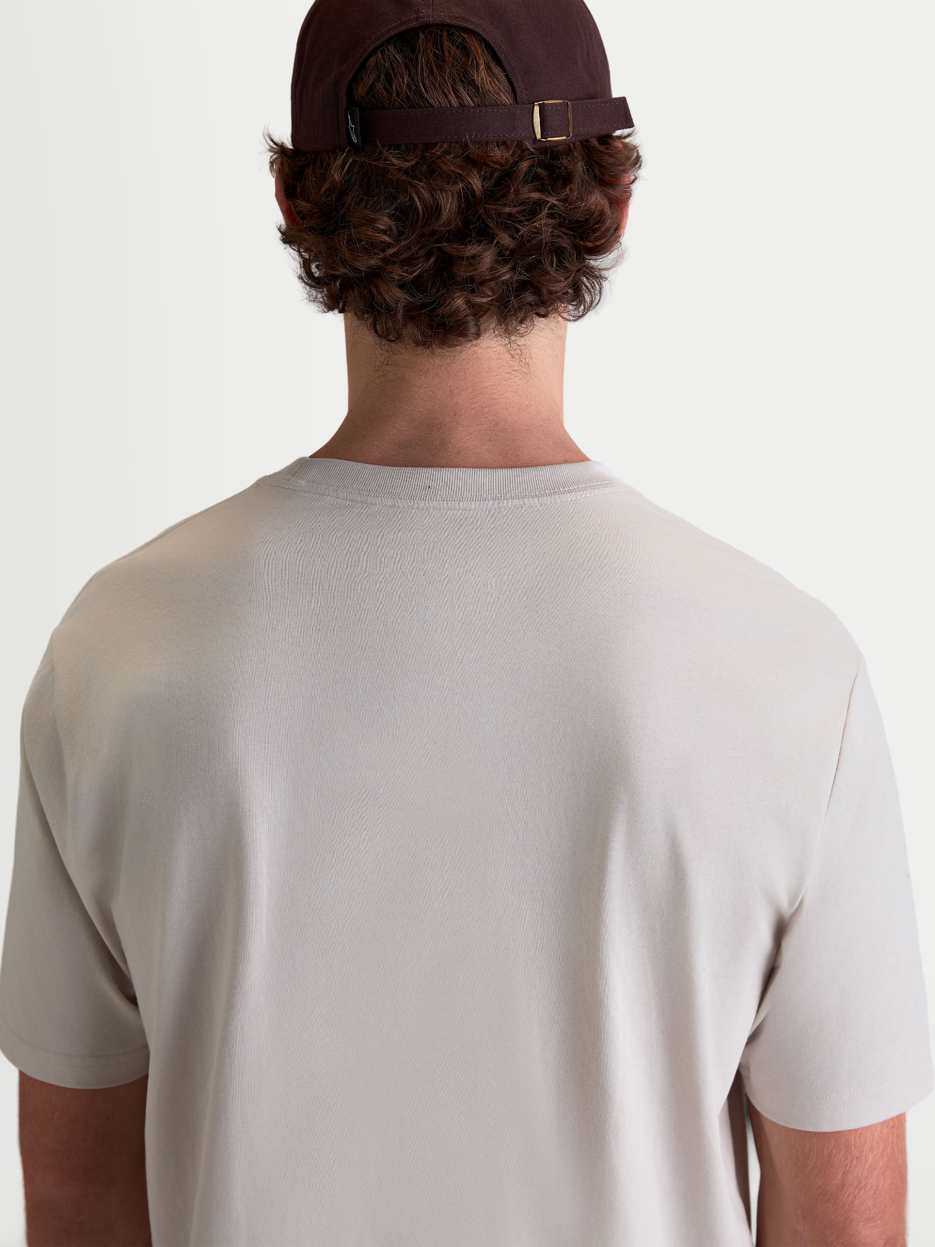 Alpinestars Elliptogrit CSF T-Shirt, Kurzarm-Sportswear-T-Shirt, Grau, Rückansicht eines Modells in einem hochwertigen Baumwoll-Polyester-Mischgewebe für den täglichen Freizeit-Lifestyle.