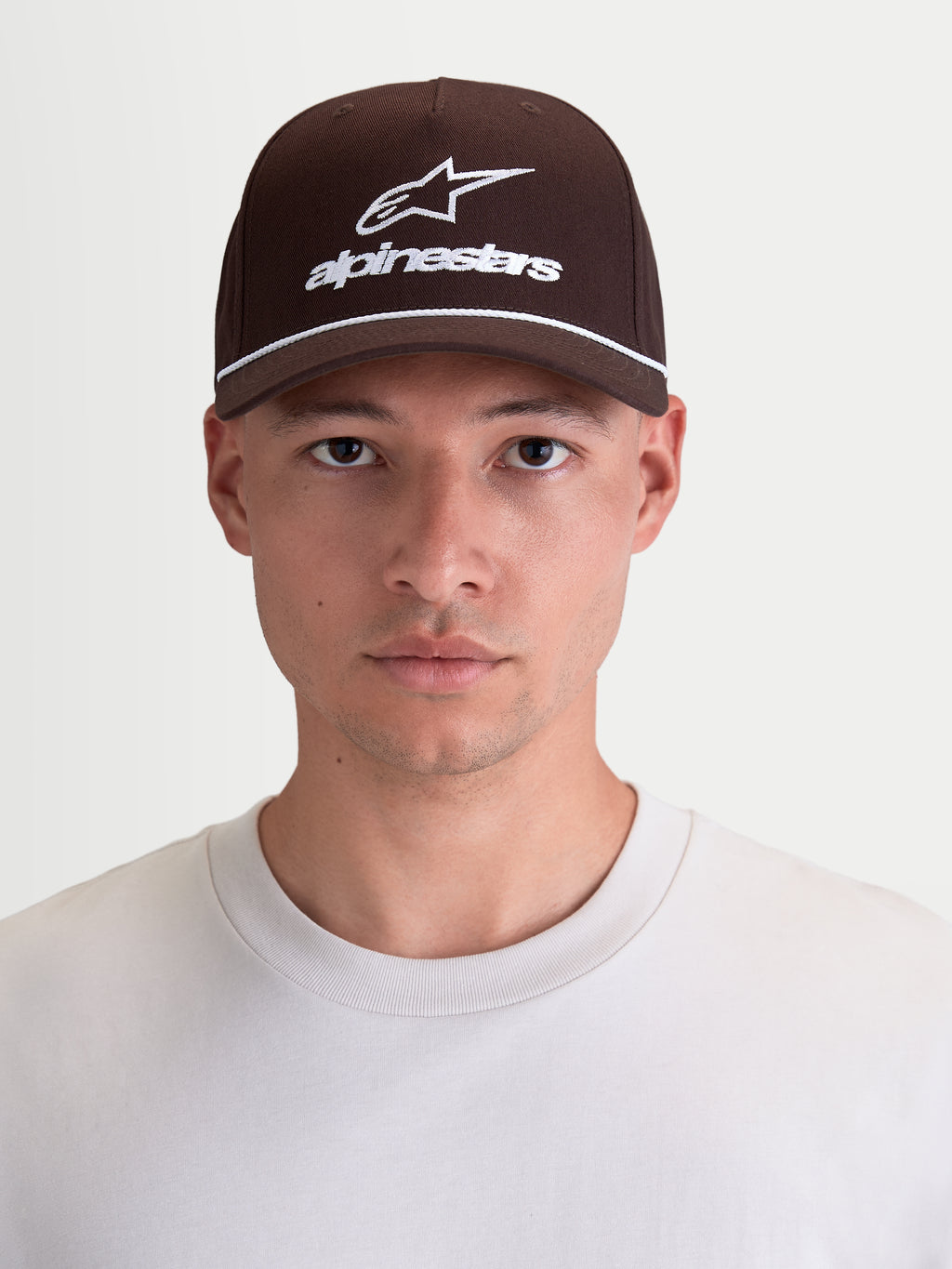 Alpinestars Combo Logo Snapback Hat, Sportswear Curved Bill Cap, Brown and White, Durable Cotton Twill with Embroidered Logo, Casual Motorsport Lifestyle Headwear, On-Model Front View