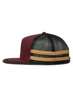 Alpinestars Backline Trucker Hat, side profile view, Brick Black and Mustard, maroon twill front with black mesh back, featuring mustard horizontal stripes on the side, flat bill with black edge trim, casual motorsport-inspired snapback