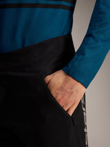 Alpinestars A-Dura Elite Flex Pants in Gray, highlighting the zippered side pocket and durable stretch ripstop fabric.