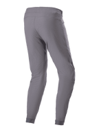 Alpinestars A-Dura Pants, MTB Cycling Pants, Dark Gray, rear three-quarter view, showing the durable 2-way stretch textile, elasticated cuffs, and ergonomic fit designed for mountain bike trail performance.