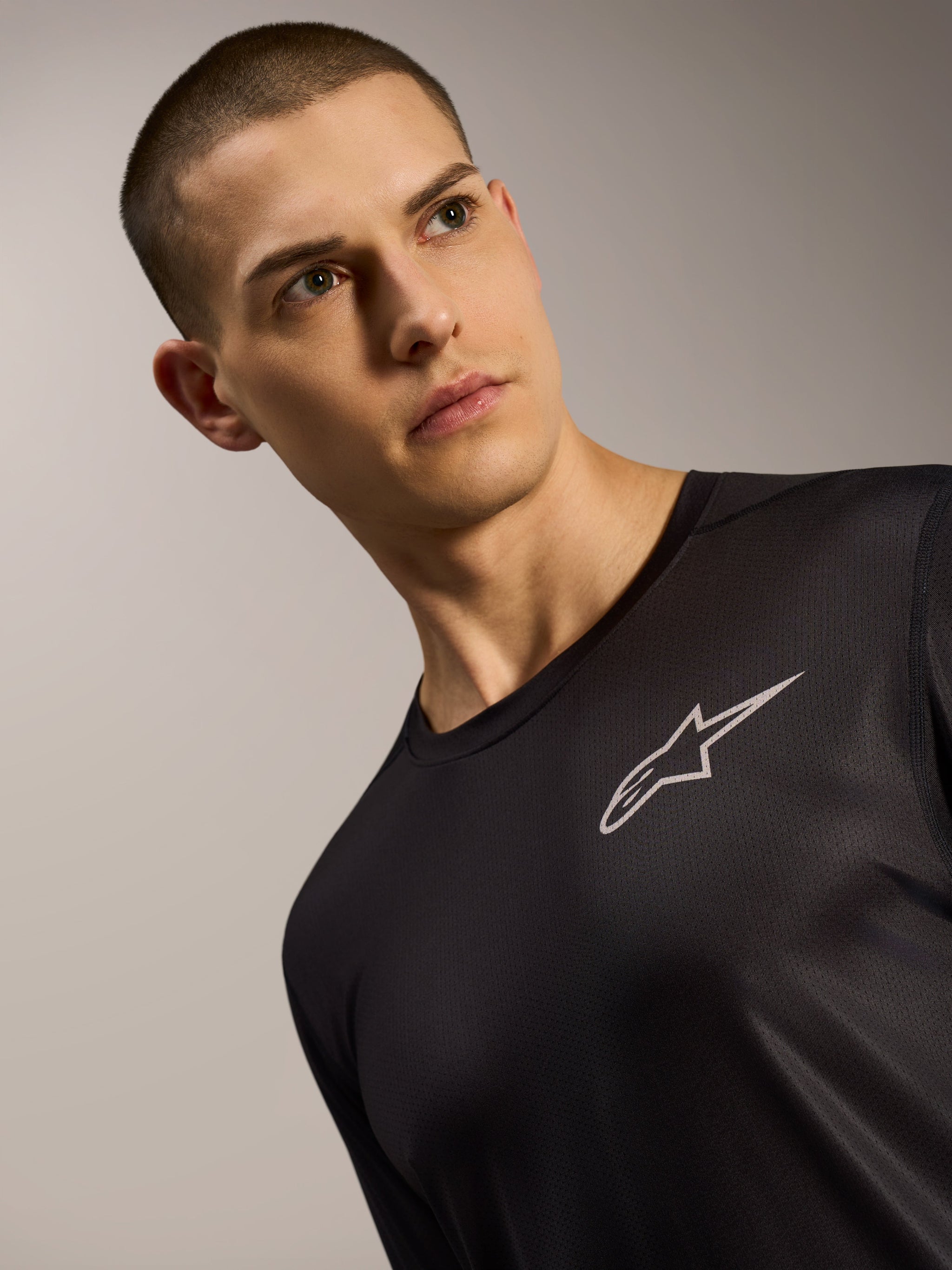 Black A-Dura Air Long Sleeve Jersey for MTB, showing breathable mesh texture and iconic Alpinestars chest logo.