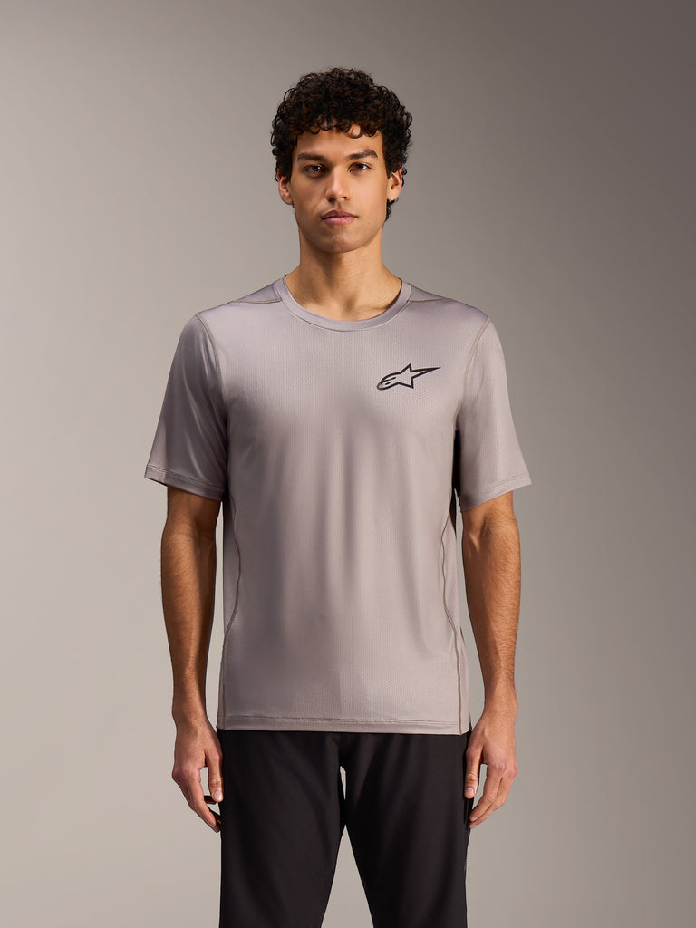 Alpinestars A-Dura Air Short Sleeve Jersey in gray, with a black chest logo and breathable jacquard mesh construction.