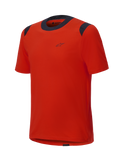 Alpinestars A-Dura Dri Wool Kurzarmtrikot, Spicy Orange mit schwarzen Mesh-Einsätzen an Kragen und Schultern, minimalistisches Design mit kleinem Logo auf der Brust, technische Mountainbike-Bekleidung