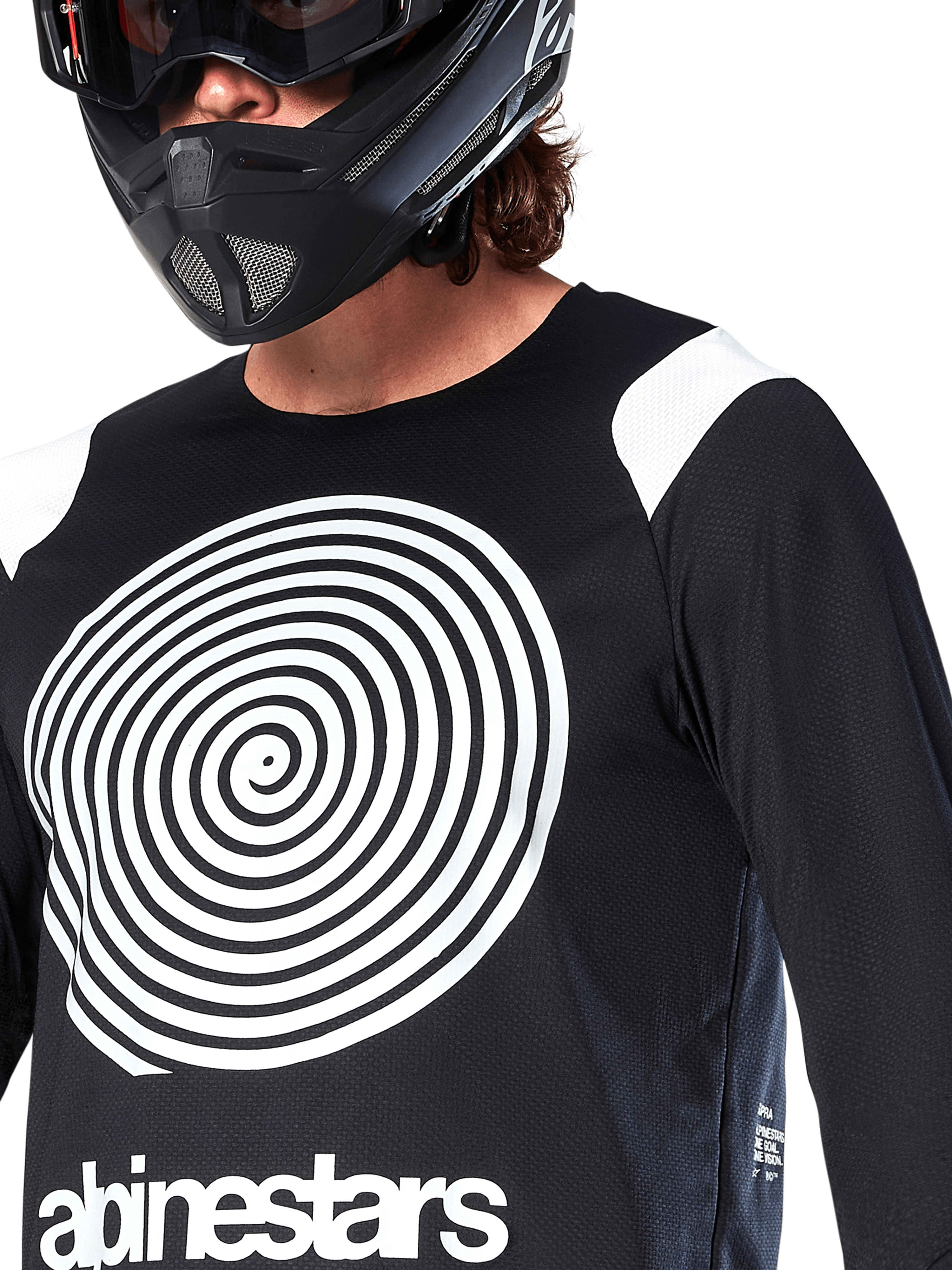 Alpinestars A-Supra Oscar Jersey, Long Sleeve, Black, featuring a large white Oscar spiral graphic on the chest and brand logo, worn by a rider with a black full-face helmet and goggles, performance mountain bike apparel for gravity riding