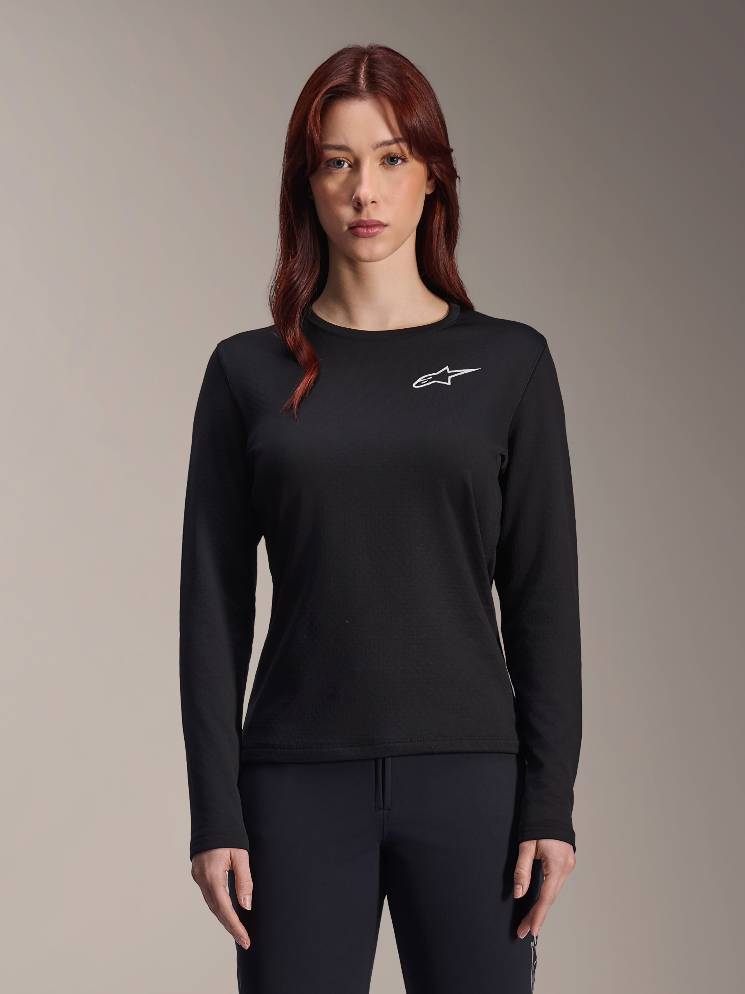 Alpinestars Stella A-Dura Thermal Jersey, Langärmliges Damen-MTB-Trikot, Schwarz mit weißem Stern-Logo auf der Brust, leichtes isoliertes Material für Radsport bei kaltem Wetter, entwickelt für das Schichtenprinzip und Komfort auf dem Trail
