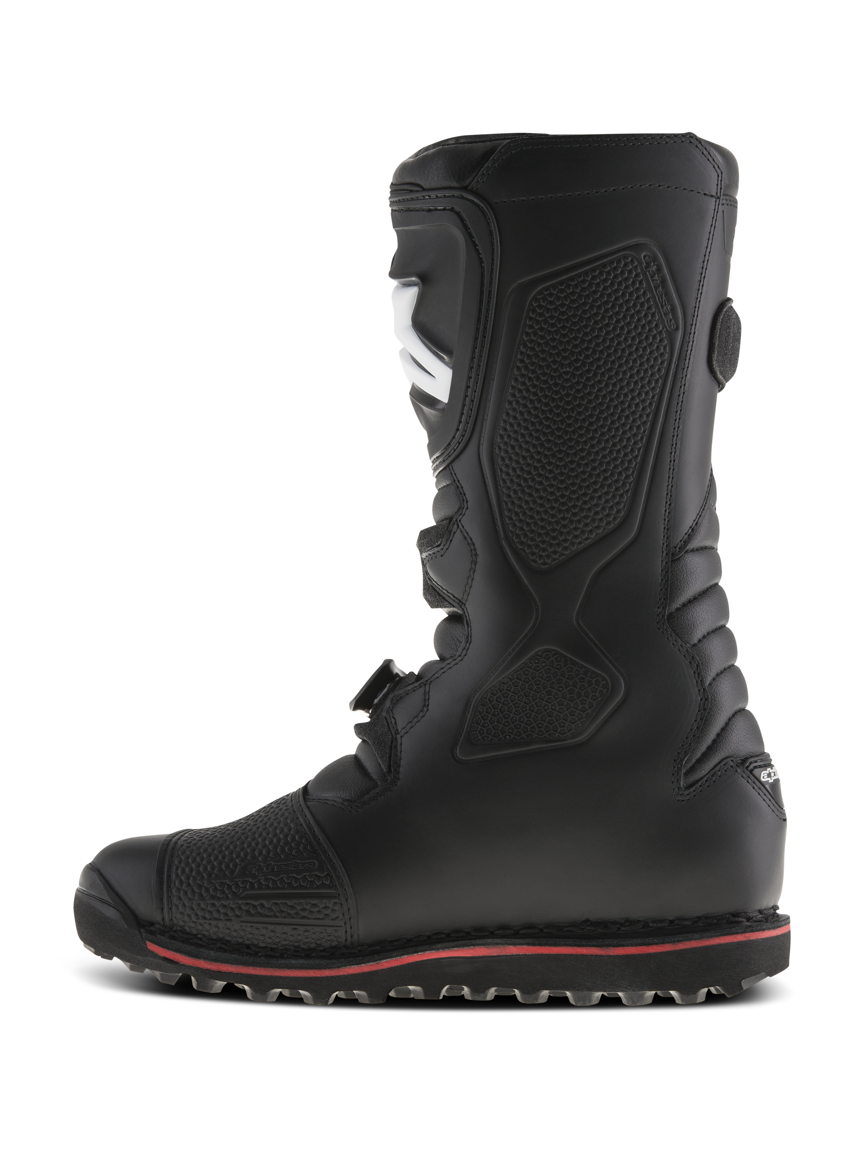Alpinestars Tech-T Stiefel, Trial-Motorradstiefel, Schwarz mit dünnem rotem Streifen an der Sohle, Seitenprofil-Ansicht, ergonomischer Schienbeinschutz, texturierte Einsätze für Grip auf den Fußrasten, strapazierfähige Lederkonstruktion für Offroad-Fahrten