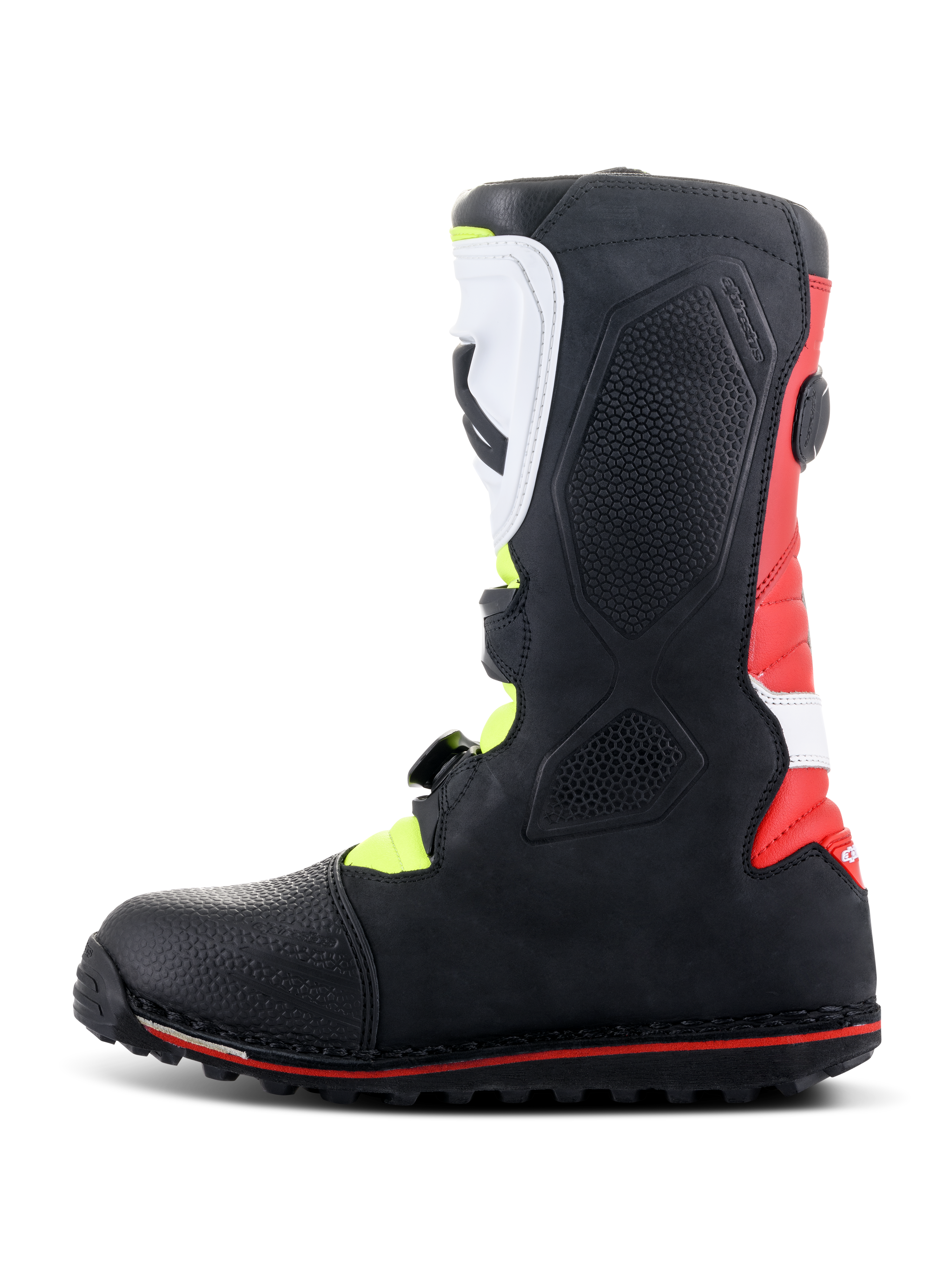 Alpinestars Tech-T Stiefel, Trial-Motorradstiefel, Weiß, Rot, Gelb Fluo und Schwarz, Seitenansicht mit ergonomischer weißer Schienbeinplatte und Schnallensystem, rotem Fersenpanel und spezieller Trial-Sohle mit roter Akzentlinie.