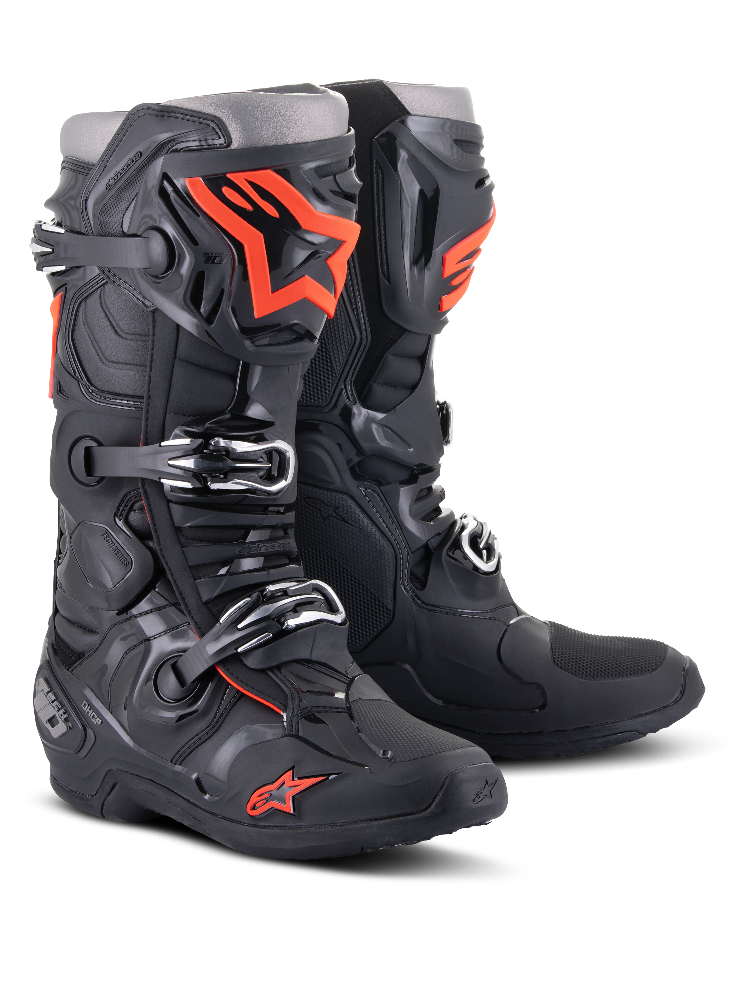 Alpinestars Tech 10 Boots, Motocross Boots, Black and Fluorescent Red, featuring a triple buckle closure system, technical TPU shell, and bold orange logos, professional-grade protective footwear for off-road racing.