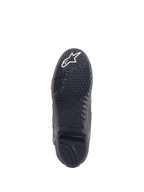 Alpinestars Tech 10 Stiefel, Motocross-Stiefel, Schwarz, Unteransicht der Sohle mit strukturiertem Gripprofil, weißem Stern-Logo an der Zehenpartie und einem austauschbaren zentralen Sohleneinsatz für Offroad-Performance.