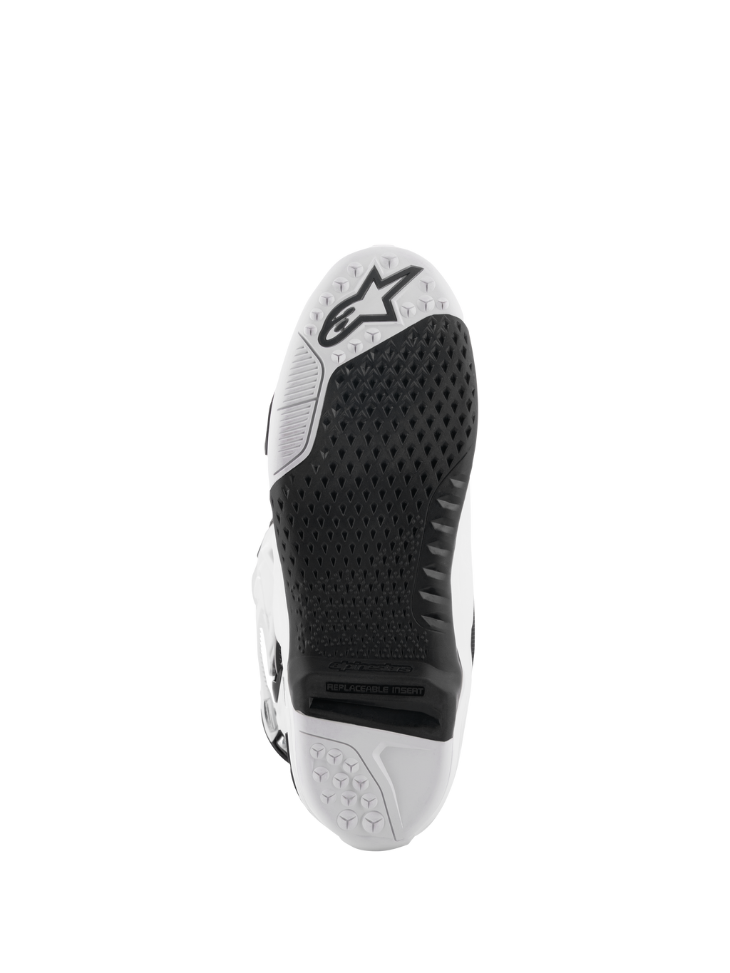 Alpinestars Tech 10 Stiefel, Motocross-Stiefel, Weiß und Schwarz, Unteransicht der Sohle mit strukturiertem Griffmuster, Alpinestars-Logo und austauschbarem zentralem Einsatz für den Offroad-Rennsport.