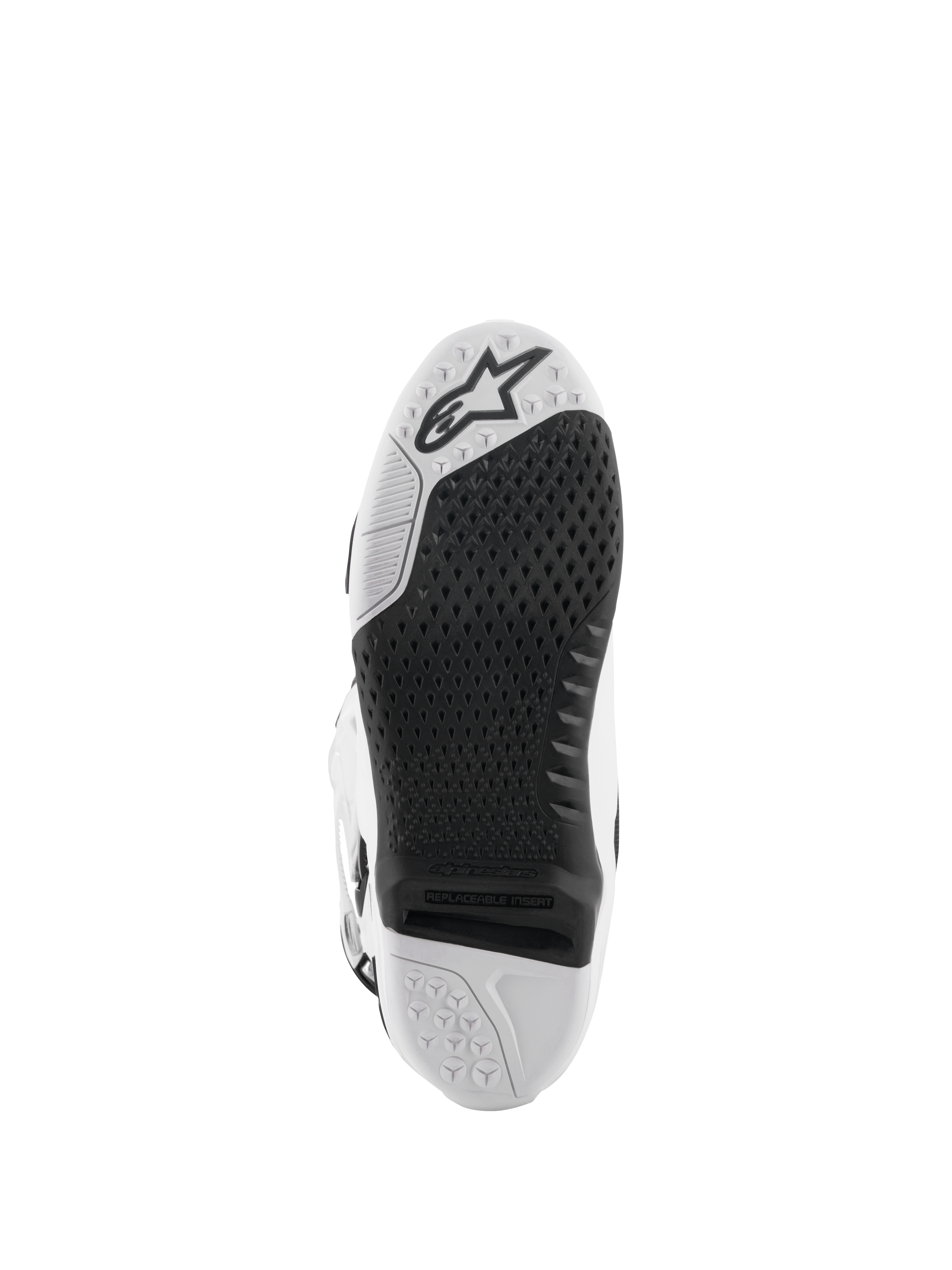 Alpinestars Tech 10 Stiefel, Motocross-Stiefel, Weiß und Schwarz, Unteransicht der Sohle mit strukturiertem Griffmuster, Alpinestars-Logo und austauschbarem zentralem Einsatz für den Offroad-Rennsport.