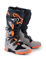 Alpinestars 2026 Tech 7 Enduro Boots, Black Warm Gray and Orange Fluo, off-road motorcycle boots with four buckle closures, rugged orange sole, protective TPU panels, and Alpinestars branding