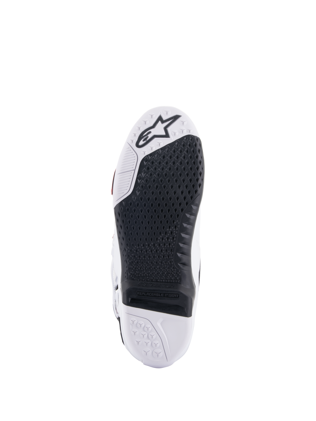 Alpinestars Tech 10 Supervented Stiefel, Sohlenansicht in Weiß und Schwarz, mit erweitertem Waben-Grip-Design, schwarzem austauschbarem Mitteleinsatz, weißem Zehenbereich mit Alpinestars Stern-Logo, optimiert für Motocross-Fußrastenkontrolle