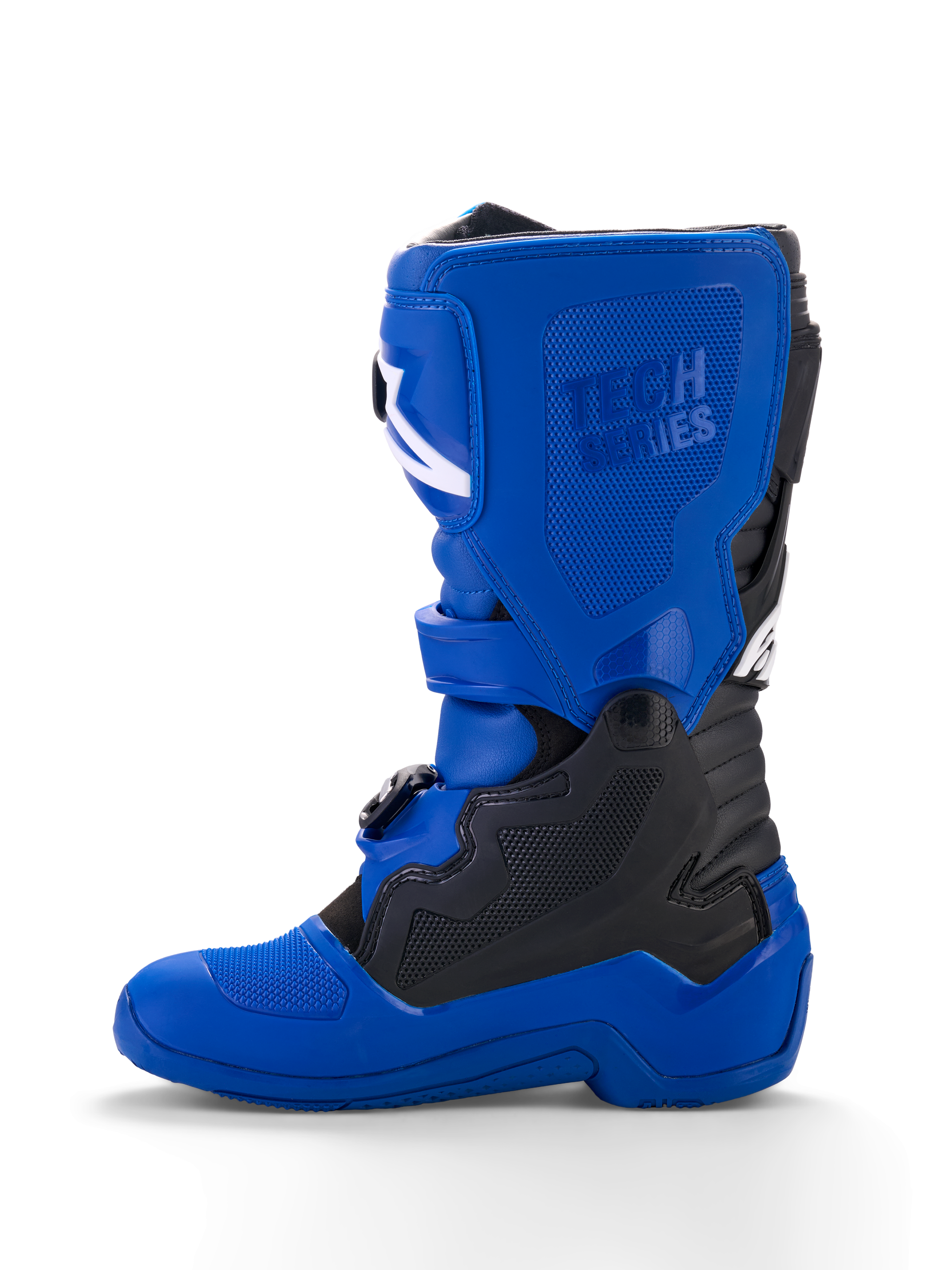 Alpinestars Yamaha Youth Tech 7S Stiefel, Jugend-Motocross-Stiefel, Blau mit schwarzen und weißen Akzenten, Seitenansicht, mit geprägtem „Tech Series“-Branding, TPU-Schutzpanelen, Schnallenverschlusssystem und einer strapazierfähigen blauen Sohle für Offroad-Performance.