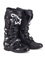 Alpinestars Tech 7 Boots, Motocross Boots, Black, featuring a rugged construction with a four-buckle closure system, TPU protective panels, and a white Alpinestars logo on the shin area, professional off-road footwear for dirt racing