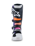 Alpinestars Tech 7 Boots, Motocross Boots, Black Light Gray Orange Fluo and Magenta, front view featuring a black shin plate with a large white Alpinestars star logo, multi-colored padded zones in orange and pink, and a durable white chassis with black buckles.