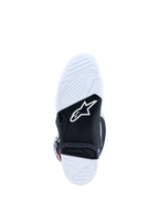 Alpinestars Tech 7 Motocross-Stiefel, Dual-Compound-Gummisohle in Weiß und Schwarz mit roter Verschleißanzeige und Logo.
