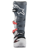 Alpinestars Tech 7 Enduro Boots, Motocross and Enduro Boots, Light Gray, Dark Gray and Bright Red, front view featuring an advanced buckle system with red straps, dark gray TPU shin plate with white star logo, and a durable light gray chassis.