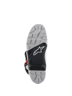 Alpinestars Tech 7 Enduro Boots, outsole view, gray and black dual-compound sole featuring a white star logo, deep textured tread for maximum off-road grip, replaceable footpeg insert designed for enduro and off-road riding durability